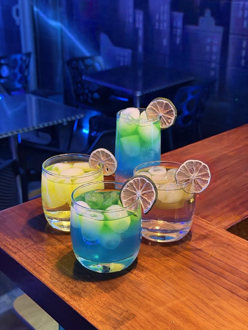 Plasma cocktails glowing on the bar